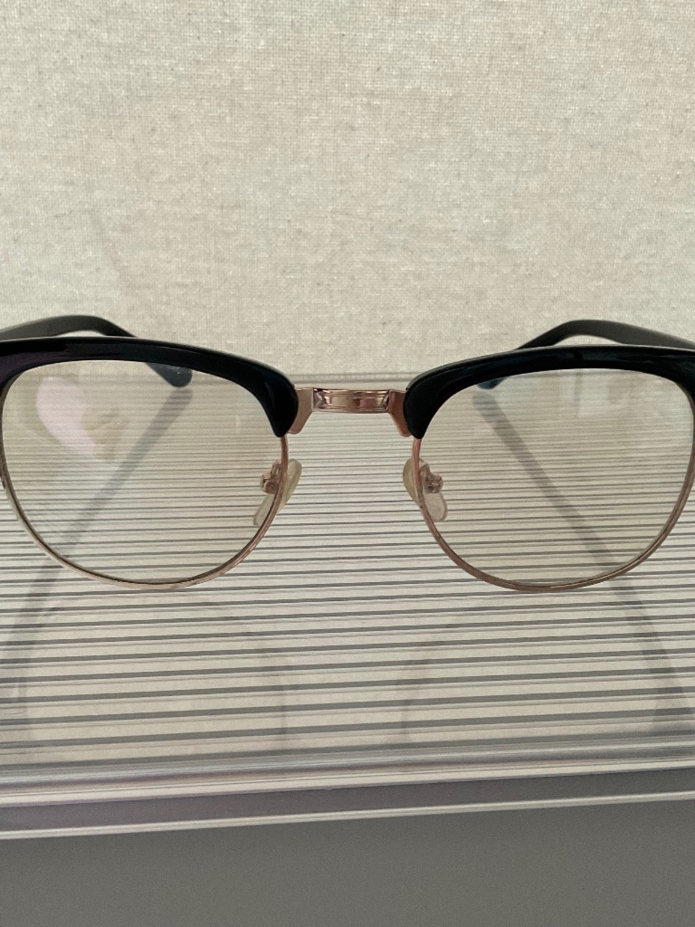 Stylish glasses, not prescribed. Black Frame, clear lens.